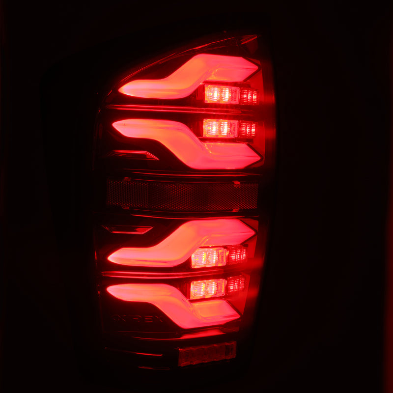 AlphaRex 16-21 Toyota Tacoma LUXX LED Taillights Blk/Red w/Activ Light/Seq Signal - Burkken Auto Parts