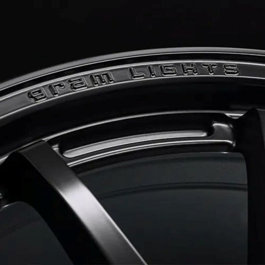 Gram Lights 57NR LIMITED II 18x7.5 +45 5-114.3 Semigloss Black Wheel w/ Black Cap/Stickers/Air Valve