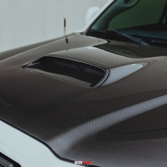 Seibon 05-11 Toyota Tacoma TR-Style Carbon Fiber Hood - Burkken Auto Parts