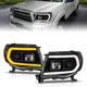 ANZO 05-11 Toyota Tacoma Projector Headlights w/Light Bar Switchback Black Housing - Burkken Auto Parts