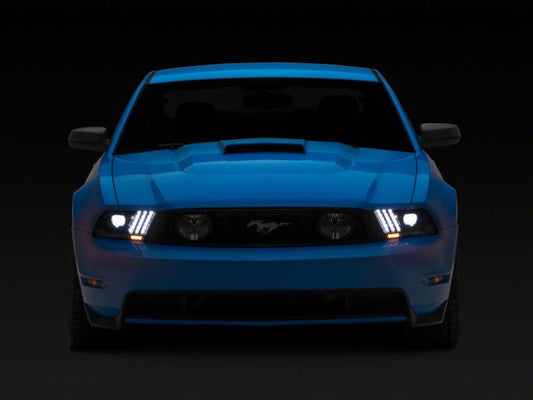 Raxiom 10-12 Ford Mustang LED Projector Headlights SEQL Turn Signals- Black Housing (Clear Lens)
