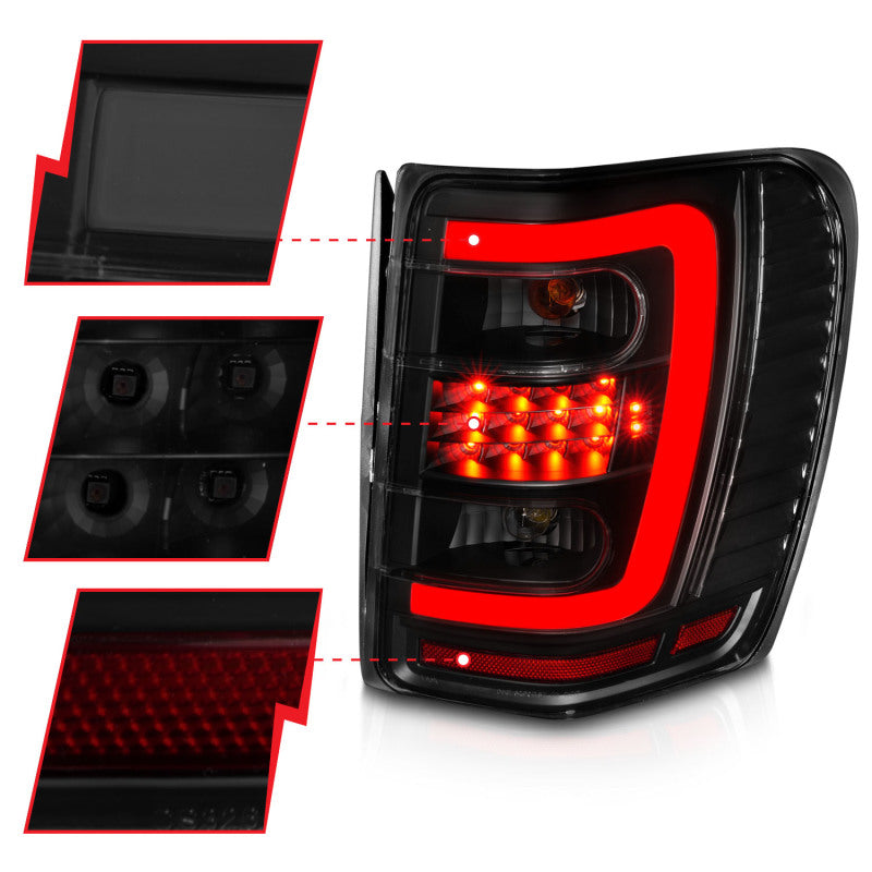 ANZO 1999-2004 Jeep Grand Cherokee LED Tail Lights w/ Light Bar Black Housing Smoke Lens - Burkken Auto Parts