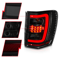 ANZO 1999-2004 Jeep Grand Cherokee LED Tail Lights w/ Light Bar Black Housing Smoke Lens - Burkken Auto Parts