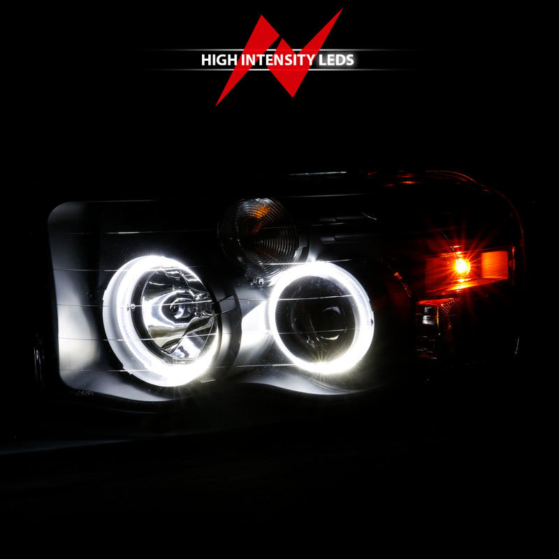 ANZO 2002-2005 Dodge Ram 1500 Projector Headlights w/ Halo Black Clear Amber - Burkken Auto Parts