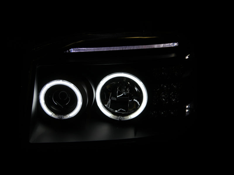 ANZO 2001-2004 Nissan Frontier Projector Headlights w/ Halo Black (CCFL) - Burkken Auto Parts