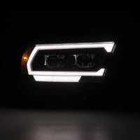 AlphaRex 19-22 Dodge Ram 1500 LUXX LED Proj Headlights Black w/Seq Activation Light/Seq Signal/DRL - Burkken Auto Parts