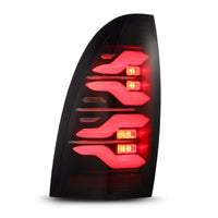 AlphaRex 05-15 Toyota Tacoma LUXX LED Taillights Blk w/Activ Light/Seq Signal - Burkken Auto Parts