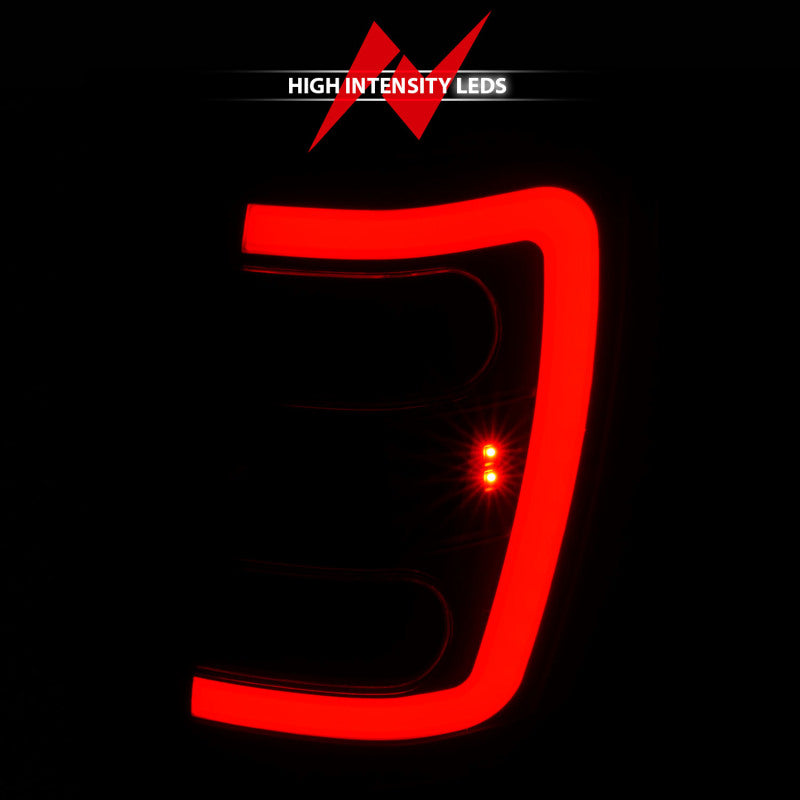ANZO 1999-2004 Jeep Grand Cherokee LED Tail Lights w/ Light Bar Black Housing Smoke Lens - Burkken Auto Parts