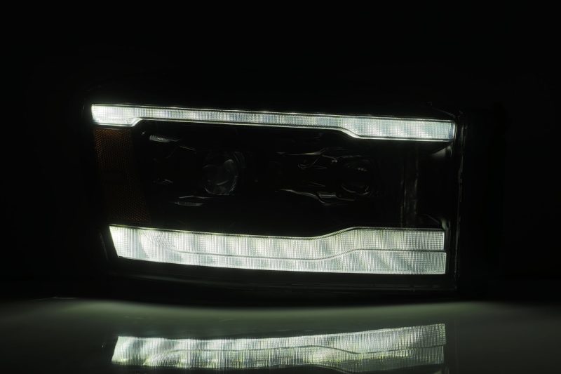 AlphaRex 06-08 Dodge Ram 1500HD PRO-Series Projector Headlights Plank Style Black w/Seq Signal/DRL - Burkken Auto Parts