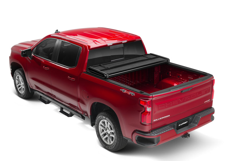 Lund 04-15 Nissan Titan (5.5ft. Bed) Hard Fold Tonneau Cover w/Bracket Kit - Black - Burkken Auto Parts