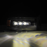 AlphaRex 02-05 Dodge Ram 1500 NOVA LED Proj Headlights Alpha Black w/Activ Light/Seq Signal - Burkken Auto Parts