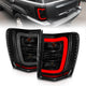 ANZO 1999-2004 Jeep Grand Cherokee LED Tail Lights w/ Light Bar Black Housing Smoke Lens - Burkken Auto Parts