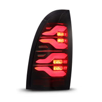 AlphaRex 05-15 Toyota Tacoma LUXX LED Taillights Blk/Red w/Activ Light/Seq Signal - Burkken Auto Parts