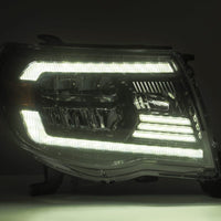 AlphaRex 05-11 Toyota Tacoma LUXX Crystal Headlights Plank Style Alpha Black w/Activation Light/DRL - Burkken Auto Parts