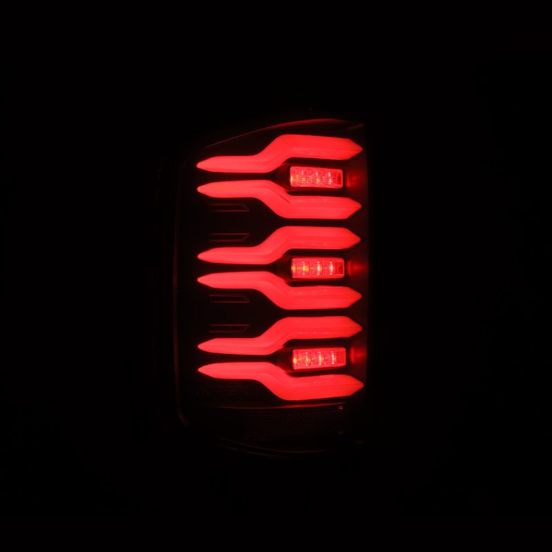 AlphaRex 14-18 Chevrolet Silverado Luxx-Series LED Tail Lights Black w/Activ Light/Seq Signal - Burkken Auto Parts