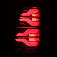 AlphaRex 05-15 Toyota Tacoma LUXX LED Taillights Blk/Red w/Activ Light/Seq Signal - Burkken Auto Parts
