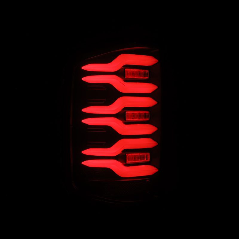 AlphaRex 14-18 Chevrolet Silverado Luxx-Series LED Tail Lights Black w/Activ Light/Seq Signal - Burkken Auto Parts