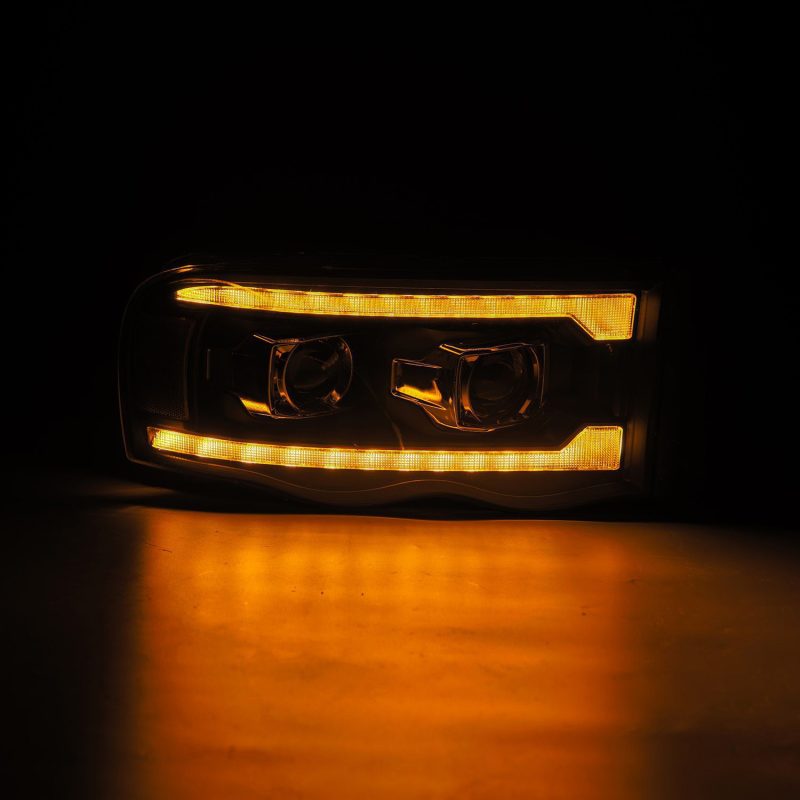 AlphaRex 02-05 Dodge Ram 1500 LUXX LED Proj Headlights Plank Style Black w/Activ Light/Seq Signal - Burkken Auto Parts
