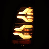 AlphaRex 05-15 Toyota Tacoma LUXX LED Taillights Alpha Blk w/Activ Light/Seq Signal - Burkken Auto Parts