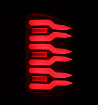 AlphaRex 07-14 Chevrolet Silverado 1500/2500HD/3500HD Luxx-Series LED Tail Lights Blk w/Smoked Lens - Burkken Auto Parts