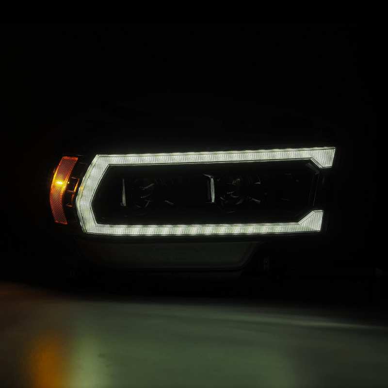 AlphaRex 19-21 Ram 2500 PRO-Series Projector Headlights Plank Style Alpha Black w/Activation Light - Burkken Auto Parts