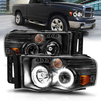 ANZO 2002-2005 Dodge Ram 1500 Projector Headlights w/ Halo Black Clear Amber - Burkken Auto Parts