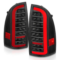 ANZO 05-15 Toyota Tacoma Full LED Tail Lights w/Light Bar Sequential Black Housing Clear Lens - Burkken Auto Parts