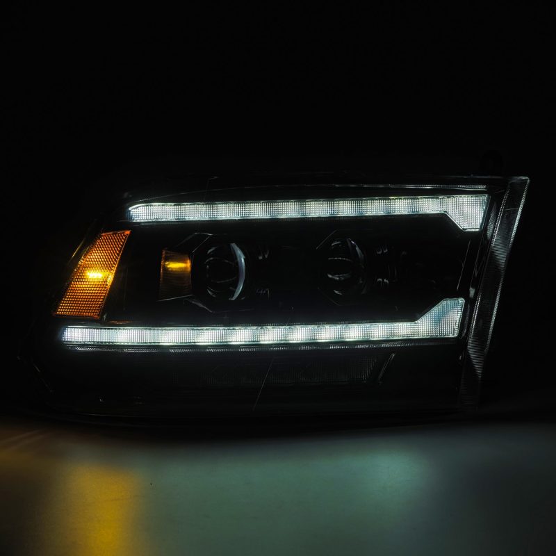 AlphaRex 09-18 Ram 2500 LUXX LED Proj Headlight Plank Style Alpha Blk w/Activ Light/Seq Signal/DRL - Burkken Auto Parts