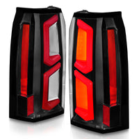 ANZO 2015-2020 Chevrolet Tahoe LED Tail Lights w/ Light Bar Black Housing Clear Lens - Burkken Auto Parts