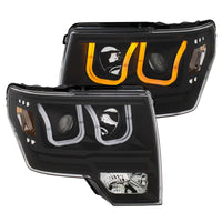 ANZO 2009-2014 Ford F-150 Projector Headlights w/ U-Bar Switchback Black w/ Amber - Burkken Auto Parts
