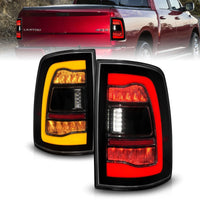 ANZO 09-18 Dodge Ram 1500 Sequential LED Taillights Smoke Black w/Switchback Amber Signal - Burkken Auto Parts