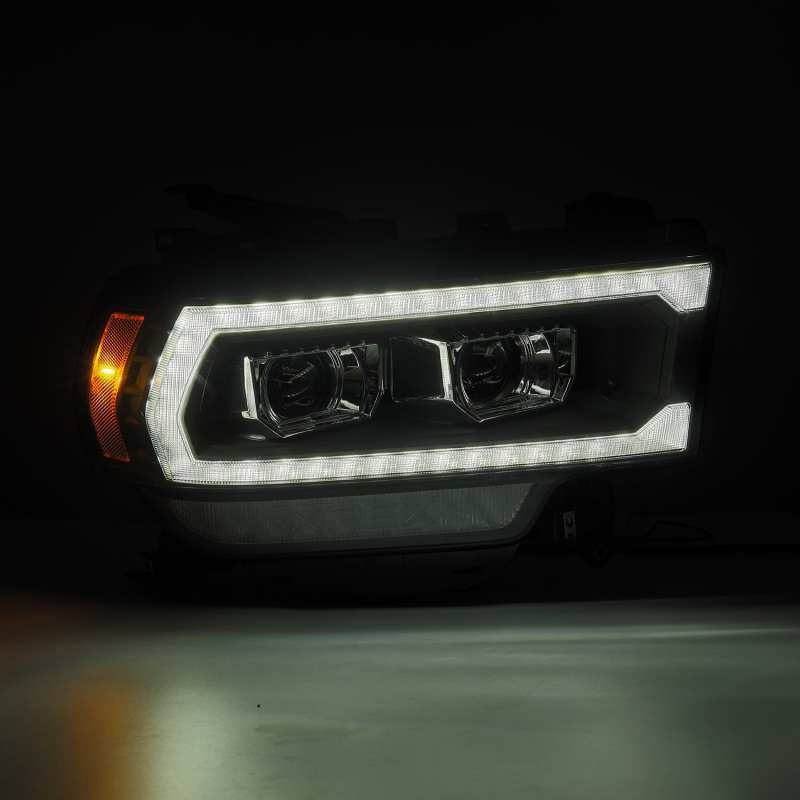 AlphaRex 19-21 Ram 2500 PRO-Series Projector Headlights Plank Style Black w/Activation Light - Burkken Auto Parts