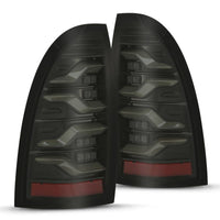 AlphaRex 05-15 Toyota Tacoma LUXX LED Taillights Alpha Blk w/Activ Light/Seq Signal - Burkken Auto Parts