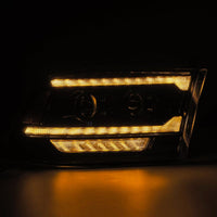 AlphaRex 09-18 Ram 2500 LUXX LED Proj Headlight Plank Style Alpha Blk w/Activ Light/Seq Signal/DRL - Burkken Auto Parts